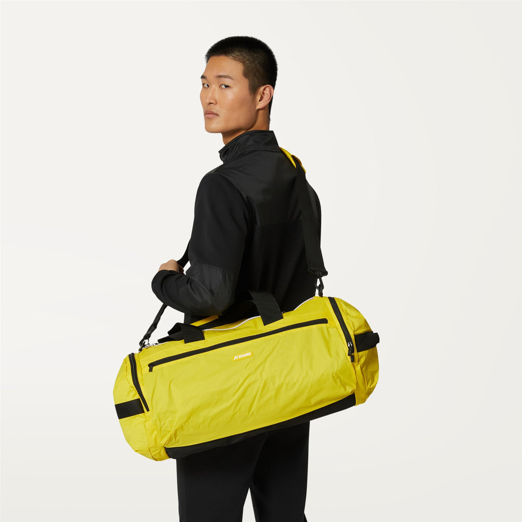 Bags_UNISEX_MAREVILLE M_Duffle_Yellow Dk - Commercial 4